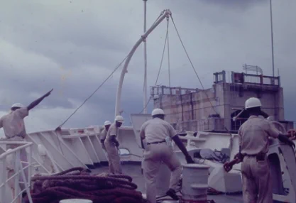 Deckhands on a ship at the Panama Canal. 1950-1972.