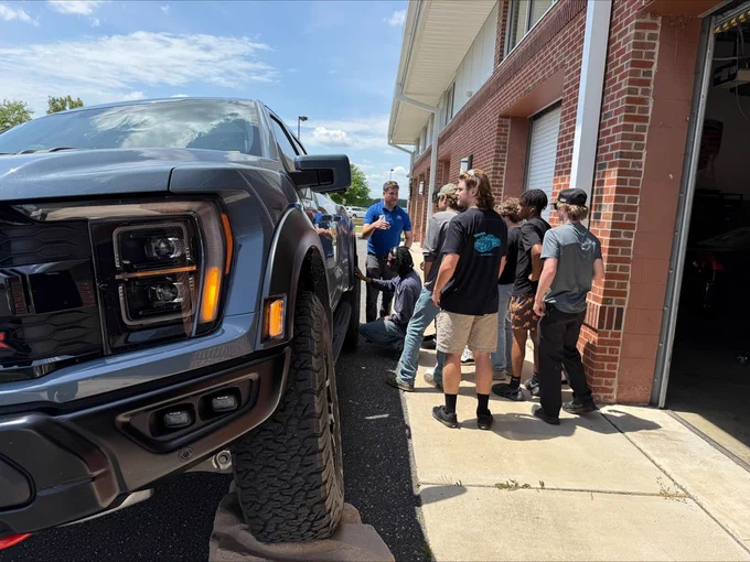 WTHS Automotive students checking out a new Ford "Raptor"
