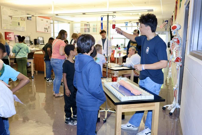 PMS students touring our BioMed classroom