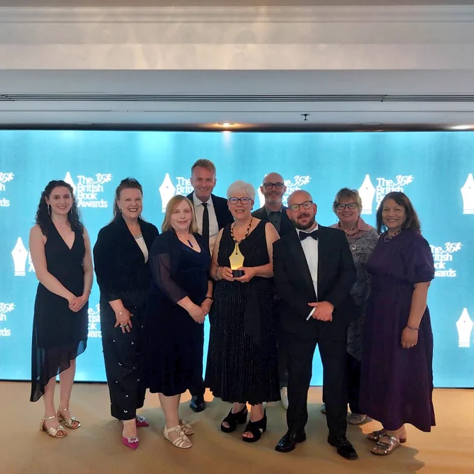 Winning team with judges and colleagues from the Reading Agency 