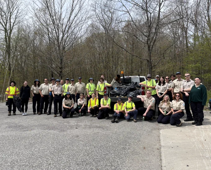 Killbear Park staff with bags of garbage, posing for a photo.