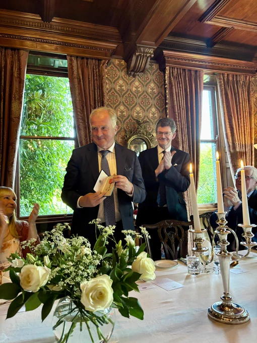 Hugo MacNeill receiving his honorary OBE