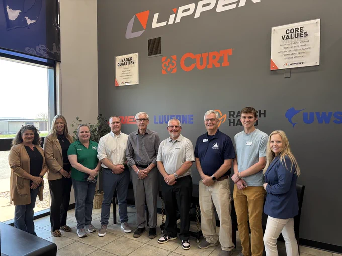 Gov. Evers poses for a group photo.