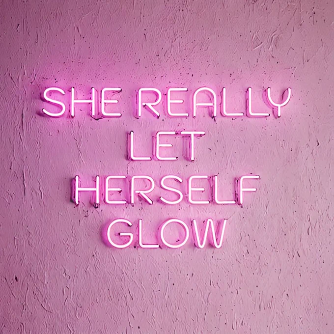 She really let herself glow. Vibrant pink neon text glowing brightly against a dark background, inspiring creators and social media enthusiasts who want bold, electrifying designs. #WordSwag #NeonAesthetic