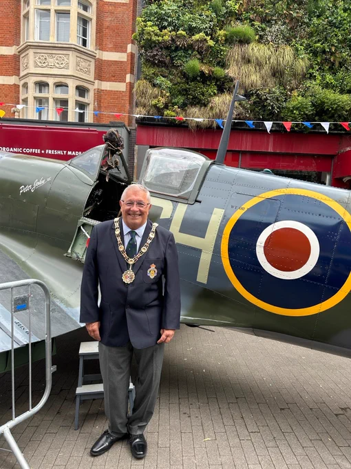 The Mayor of Sutton, Cllr Colin Stears, photographed with the spitfire plane