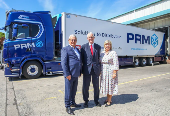  Secretary of State Hilary Benn with CEO and Founder of PRM Group Philip Morrow and Company Director Lynne Morrow.