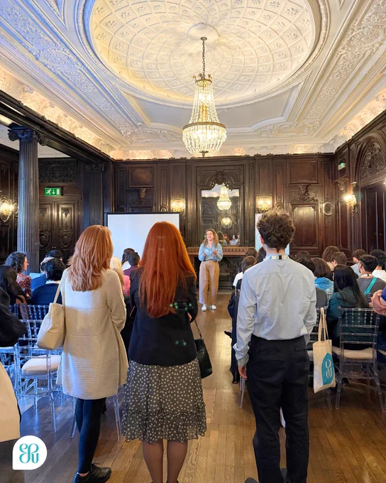 A photo of the International Public Speaking Competition participants gathered together at Dartmouth House.