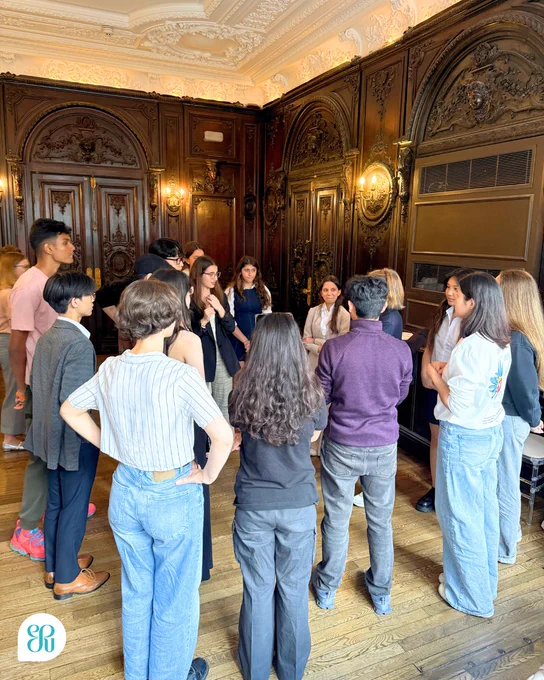A photo of the International Public Speaking Competition participants gathered together at Dartmouth House.