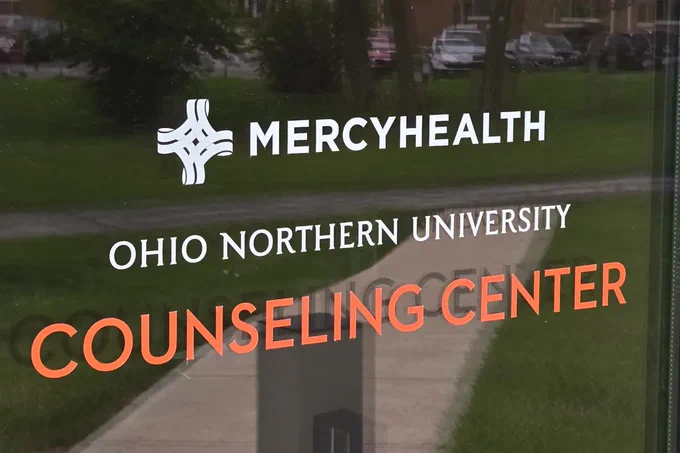 A sign as it appears on the Ohio Northern University Counseling Center’s main entrance. (Northern Review Photo/Sam Schneider)