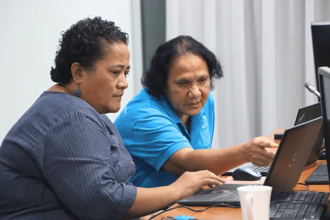 Lili Motufaga of SPC co-facilitates the Assessment Instrument Development Micro-Qualification workshop, assisting a participant with her assessment task.
