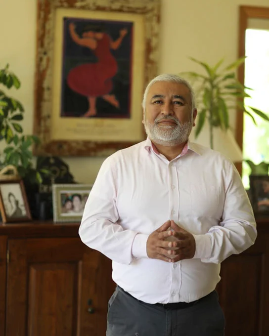 Photo of Ernesto Fonseca wearing a white dress shirt