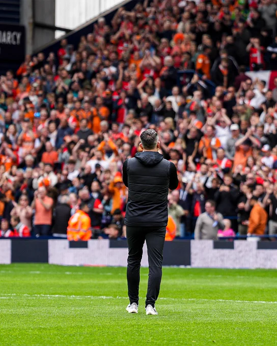 Matt Bloomfield clapping the Luton fans at The Hawthorns before kick-off.