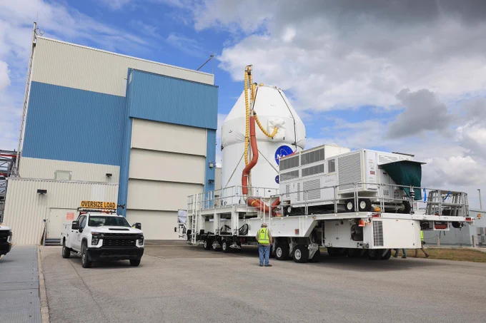 Exploration Ground Systems teams transport the agency’s Artemis II Orion spacecraft from the Neil A. Armstrong Operations and Checkout Building to the Multi-Payload Processing Facility at Kennedy Space Center.