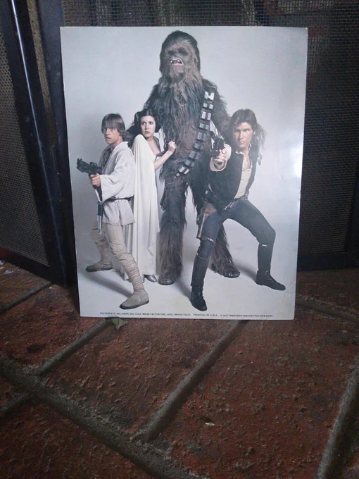 The original studio photograph from the the Official Star Wars Fan Club from the 70s with Chewbacca, Luke, Leah, and Han Solo. 