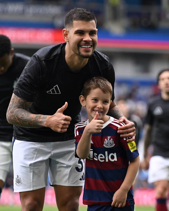 Bruno Guimarães with our mascot for the day