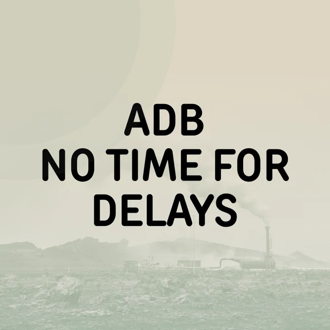 black text "ADB NO TIME FOR DELAYS" on a pale grey filtered background image of a power plant