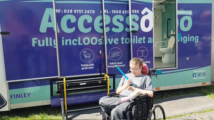 My wheelchair user 17 year old daughter in front of the @Accessoloo mobile #ChangingPlaces toilet 