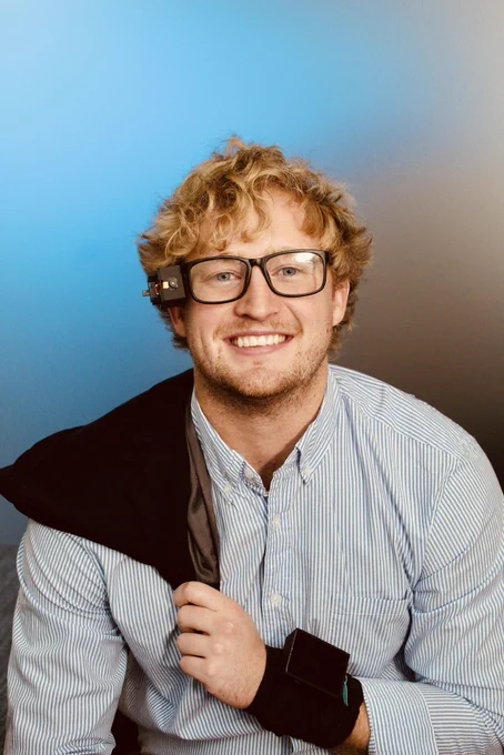 CEO, Jack, wearing ALeye with his jacket draped over his shoulder, like a Jedi cloak