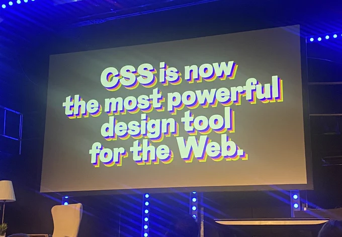 A large screen displays the text: "CSS is now the most powerful design tool for the Web“.
