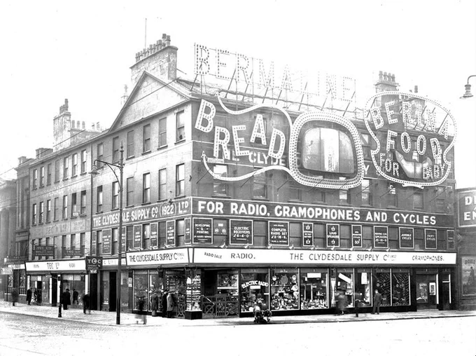 Electric signs for Bermaline Bread and Berina Food for Baby on the front of The Clydesdale Supply Company building, Bridge Street, March 1932.
Archive ref: D-CA8/394