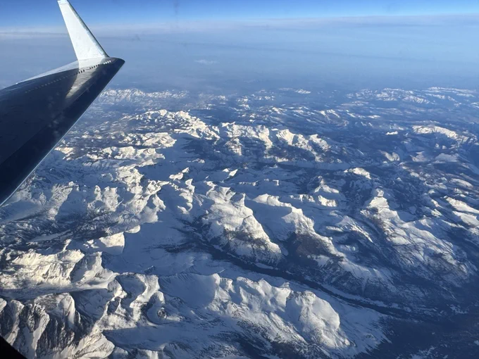 The C-20A aircraft, based at NASA’s Armstrong Flight Research Center in Edwards, California, flies over the Sierra Nevada Mountains in California for the Dense UAVSAR Snow Time (DUST) mission on Feb. 28, 2025. Credit: NASA/Starr Ginn