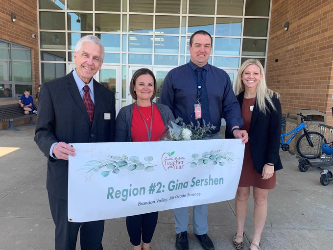 Region 2 Teacher of the Year Gina Sershen (in red) with Secretary Graves (left), her principal Nick Skibsted and DOE's Allison Englund (right)