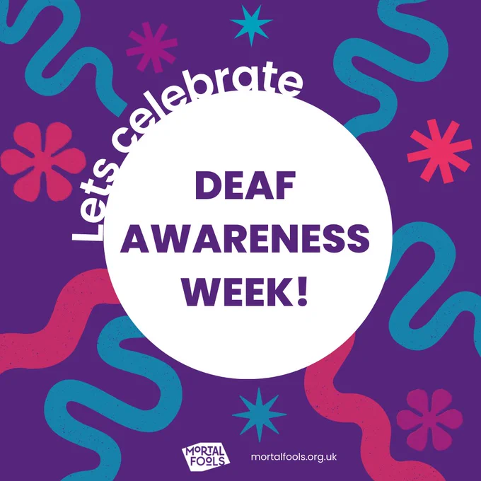 Deaf Awareness Week promoting graphic, featuring the phrase 'Lets celebrate deaf awareness week!' and including Mortal Fools logo and website address. The background features purple, blue and pink abstract patterns and simple star and flower shapes. 