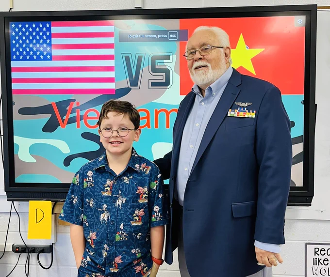Man and boy standing