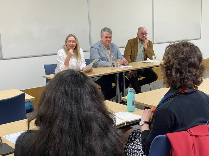 Philippa Townsend, J Thomas Hewitt, and Matthew Novenson sitting at a table discussing Matt’s new book.