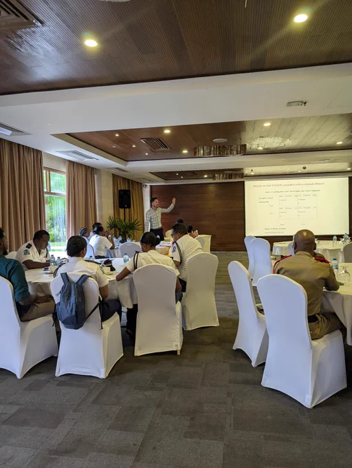 Professor Mark Walters in conference room providing training to the Seychelles Police Force on recognising hate crimes and applying the new legislation.