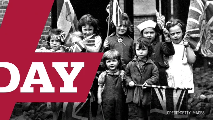 World War II. Victory in Europe Day. Young children in bomb scarred Battersea in south London (England) with their Union Flags. May 8, 1945. 