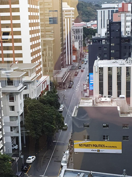View from Wellington City Council building down The Terrace showing a new sign that says "NO PARTY POLITICS in Council"