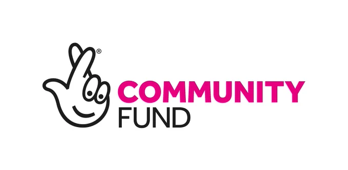The national lottery logo with ‘community fund’ written next to it. A white background with a black logo and both pink and black text.