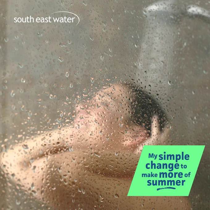 photo taken of a person taking a shower with water droplets on the shower screen. There is the South East Water logo in the top left hand side, and the words 'My simple change to make more of summer' on a green box in the bottom right hand corner.