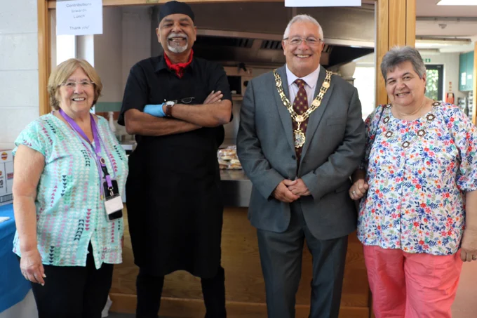 The Mayor of Sutton, Cllr Colin Stears and Mayoress Sue Stears photographed with Christine Lindsay and Chef Arif who provided free curry and samosas