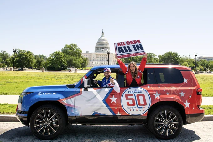 Mike Ploger and Annie Mae sit in the Weagle Wagon in front of the U.S. Capitol.