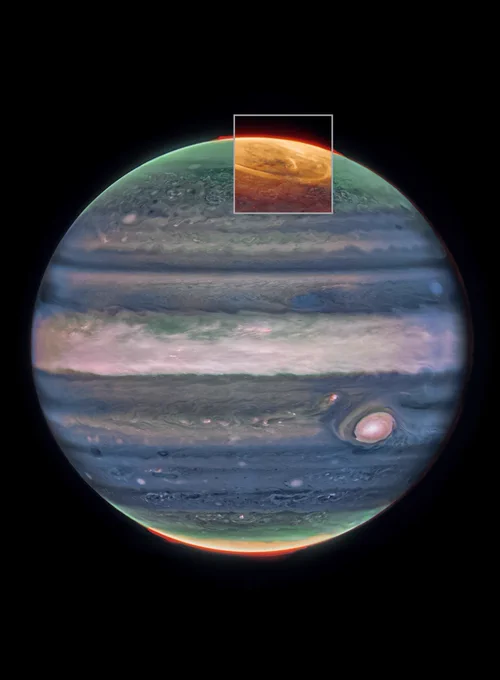 The planet Jupiter as seen in near-infrared light. Its clouds are dark blue and white in color, with some red spots within the clouds, while its poles are tinged with green, yellow, and red. A box over the North Pole is overlaid with more data in shades of orange, displaying auroras as arcs and rings. Credit: ESA/Webb, NASA, CSA, J. Nichols (University of Leicester), M. Zamani (ESA/Webb)