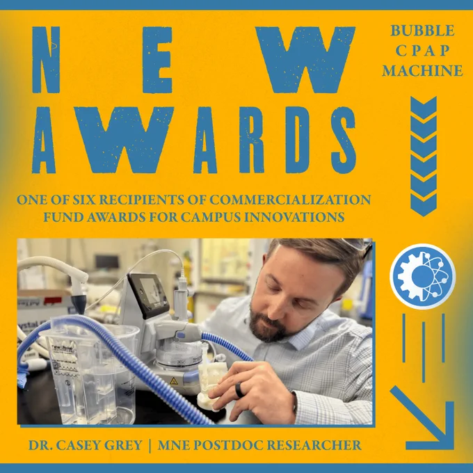 Post with a photo of “Dr. Casey Grey | MNE Postdoc Researcher.” Has text which reads, “NEW AWARDS,” “Bubble CPAP Machine,” & “ONE OF SIX RECIPIENTS OF COMMERCIALIZATION FUND AWARDS FOR CAMPUS.” Also included is a blue MNE logo.