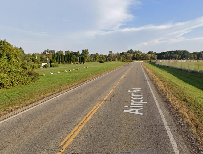 Airport Rd, with no bike lanes