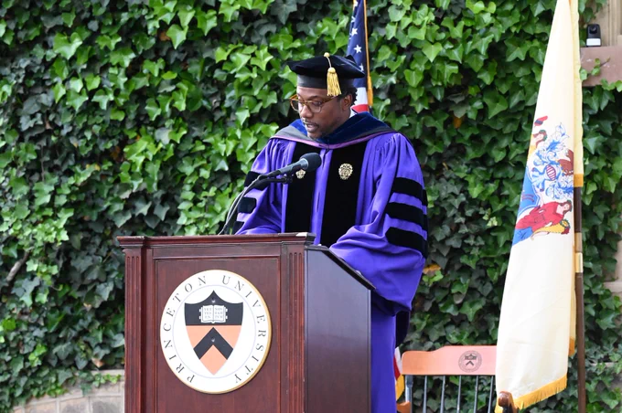 Rodney Priestley speaks at a podium