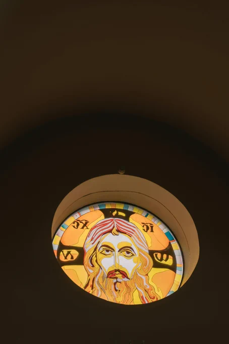 Photo by Mikhail Nilov: https://www.pexels.com/photo/stained-glass-window-with-jesus-likeness-8719156/