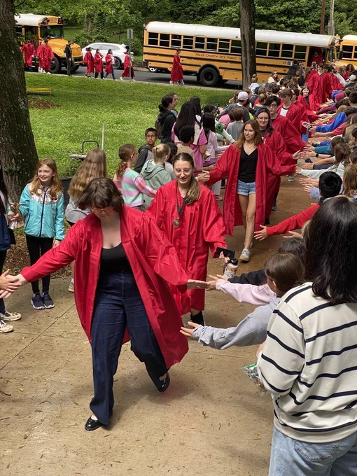Meridian Seniors walk through their previous schools during Grad Walk.