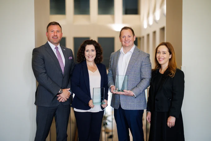 Dr. Jay Garner, dean of the School of Health Related Professions, is joined, from left,  by Dr. Kristi Moore, 2025 Alumnus of the Year, Dr. Luke Bynum, Early Career Achievement Award winner, and Dr. Whitney Bondurant, SHRP Alumni Board President.