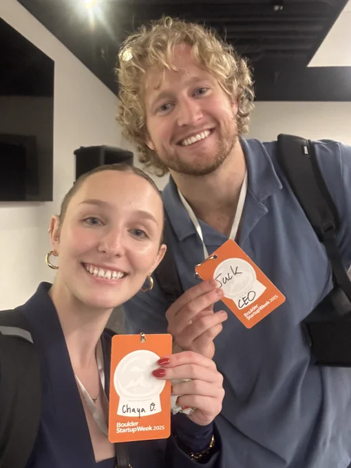 Selfie with Founder and CEO, Jack Walters, and VP of Marketing, Chaya O’Grady proudly showing their Boulder Startup Week name tags after the event.