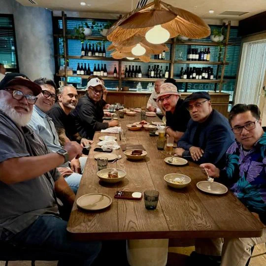 David Fane and the rest of the cast of Naked Samoan's eating at a table
