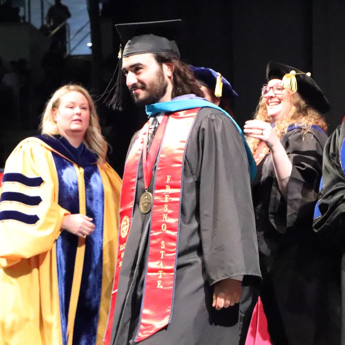 Political Science Department Chair Lisa Bryant and faculty Naomi Bick and Social Sciences Dean Elizabeth Lowham and Graduate Dean's Medalist Robert Cordova (Master’s of Public Administration) 