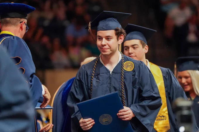 Jarret Birch receives his diploma