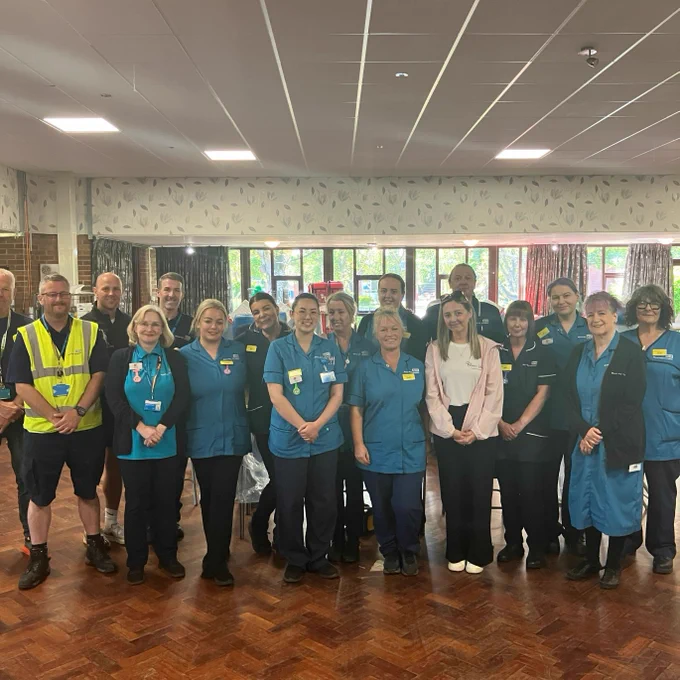 Staff at a special donation session supported by the family of Elsie Dot Stancombe, one of the victims of the tragic Southport attacks, are joined by her mum and dad, Jenni and Dave in a group photo.