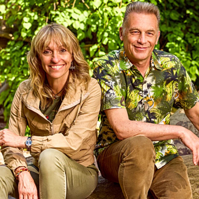 Chris Packham, Michaela Strachan and Iolo Williams stood outside wearing warm clothing 
