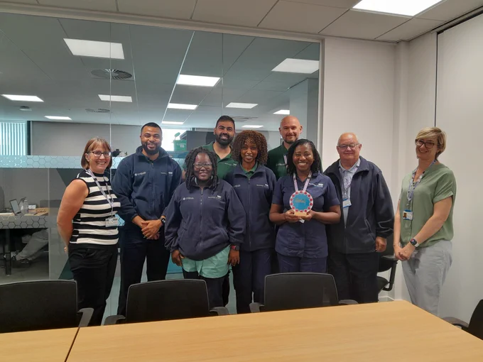 Central Discharge to Assess Team celebrating gold accreditation